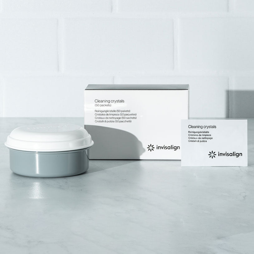 Invisalign cleaning system with cleaning crystals and tub