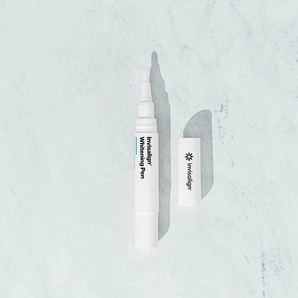 Invisalign teeth whitening pen flatlay